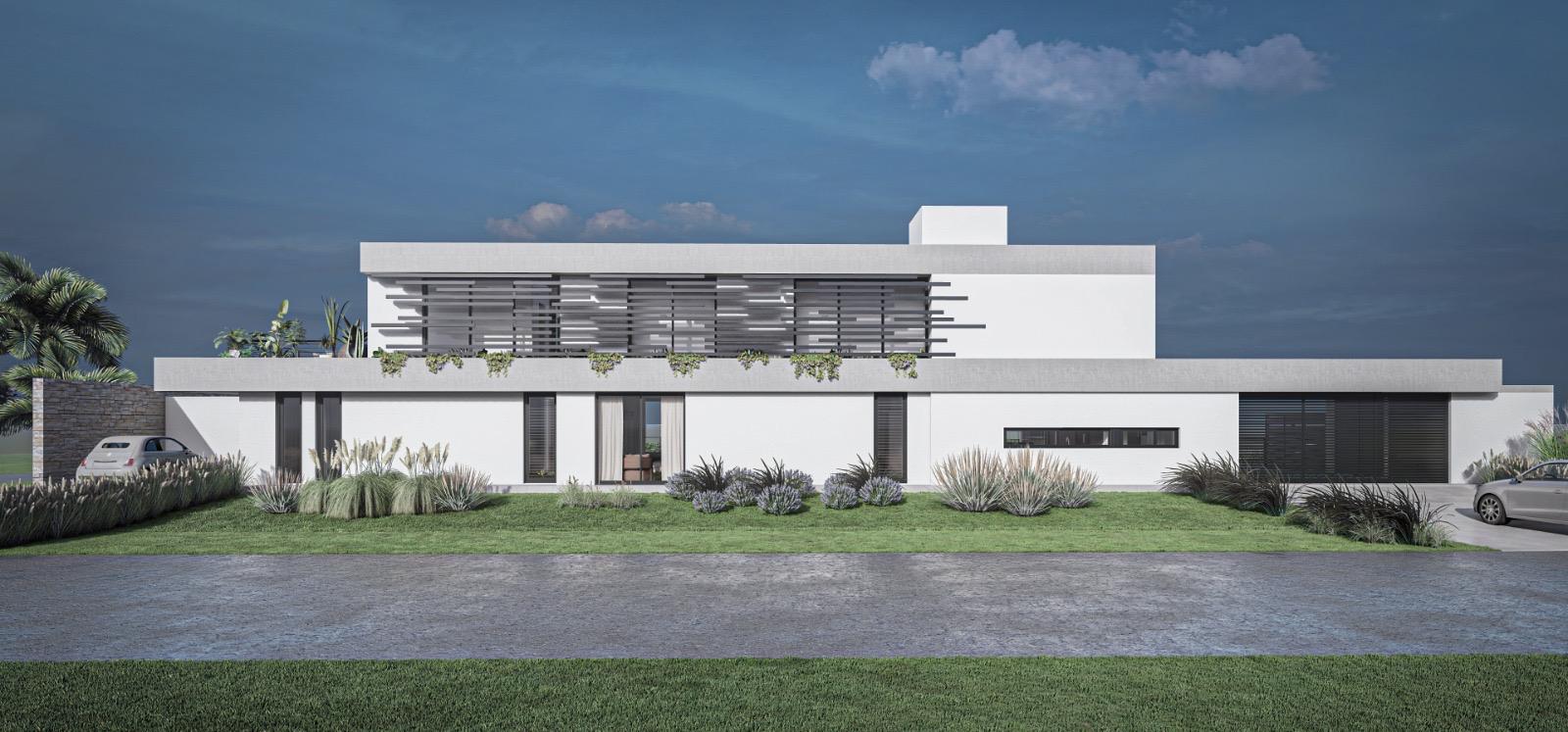 Fachada de vivienda con jardín frontal parquizado y especies ornamentales