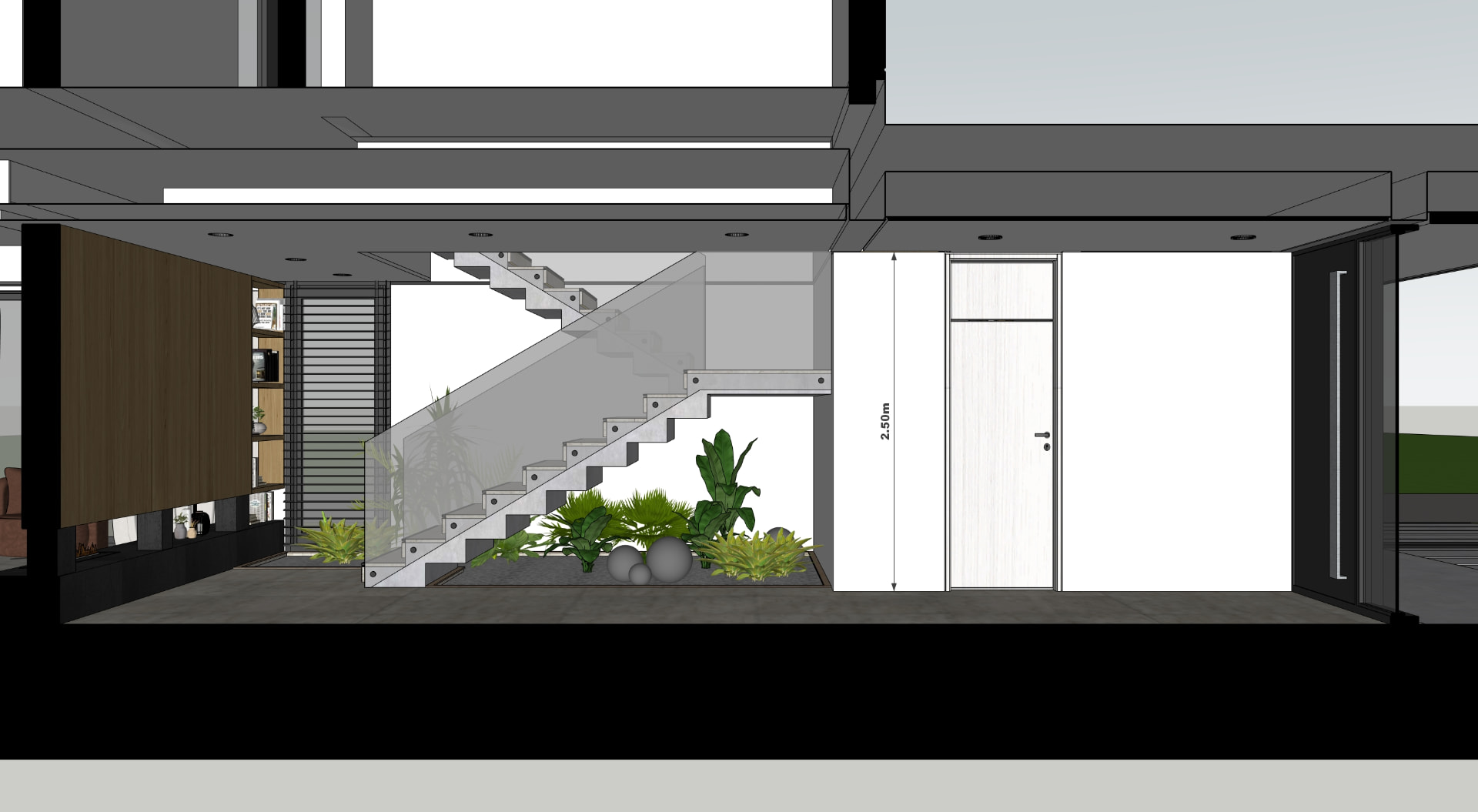 Hall de ingreso con escalera, vegetación y recepción
